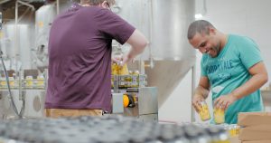 two men working at brewery